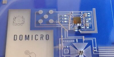 Integrating thinned bare dies with inkjet printing interconnect