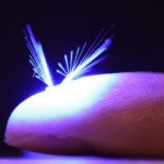 Artificial seed robot flies by the power of wind and light