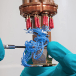 Pairing up equal-spin electrons in a two-dimensional platform