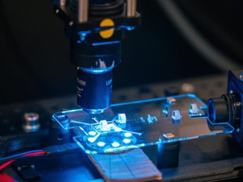 All glass femtosecond laser spinout for photonic quantum computing