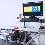 First terahertz line scanner with monolithically integrated detector