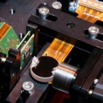 A low power programmable network for optical AI