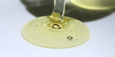 Small submarine robots can swim in honey