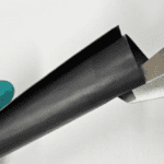 A single thin film perfectly absorbs all electromagnetic waves