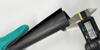 A single thin film perfectly absorbs all electromagnetic waves