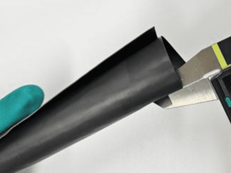 A single thin film perfectly absorbs all electromagnetic waves