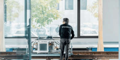 A magnetic levitation vehicle capable of running on an existing rail