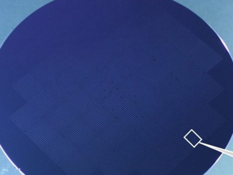 Tiling process mounts InP optical devices on 300mm substrate