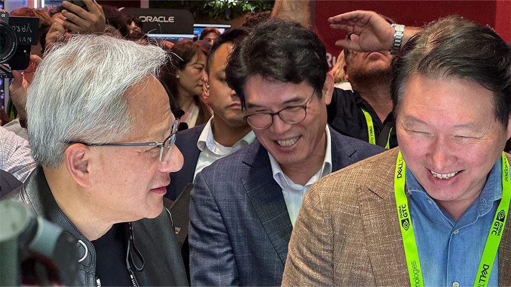Nvidia CEO Jensen Huang and SK Group chairman Chey Tae-won speaking on a crowded exhibition floor at Nvidia GTC 2026