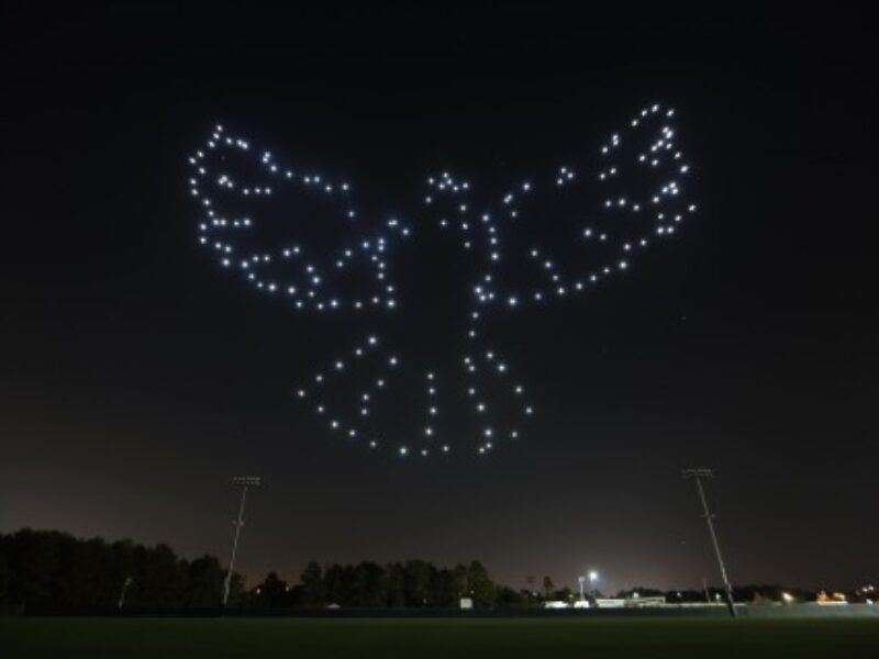 RGB LED-bearing drones synchronize into gigantic display