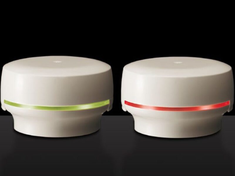 Wireless transmitter for production data mounts on signal towers