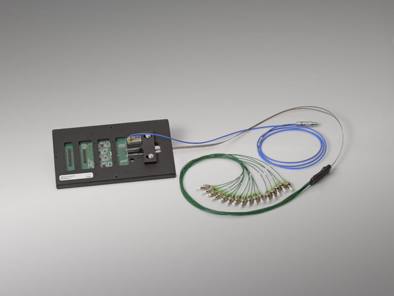 Optical test probe card for photonic circuits