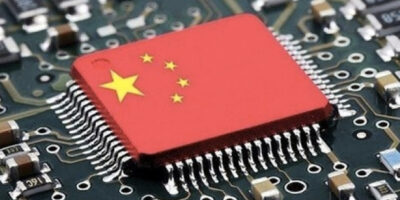 Foxconn to sell stake in Tsinghua Unigroup, faces fine