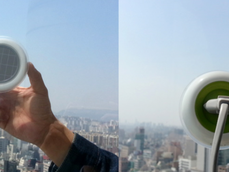 Solar socket sticks to window to provide power
